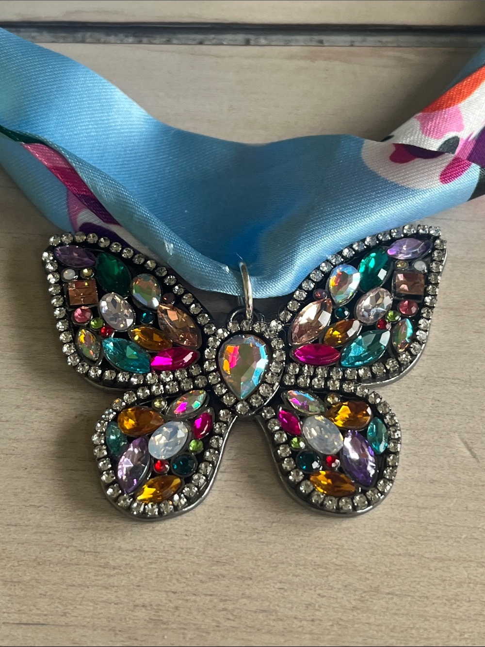 Blue Floral Ribbon Necklace with Jeweled Butterfly Pendant - Picture 4 of 4